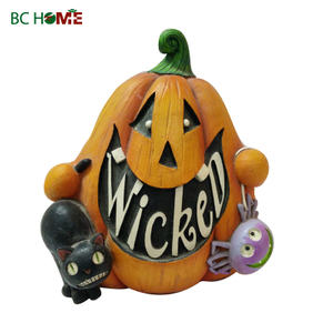 Pumpkin head with cat and spider halloween decotation